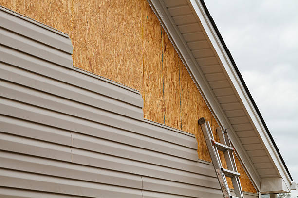 Professional Emergency Siding Repair technician working in Coal Center, PA